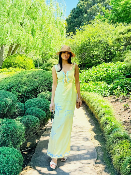 A breezy, lemon- yellow maxi dress