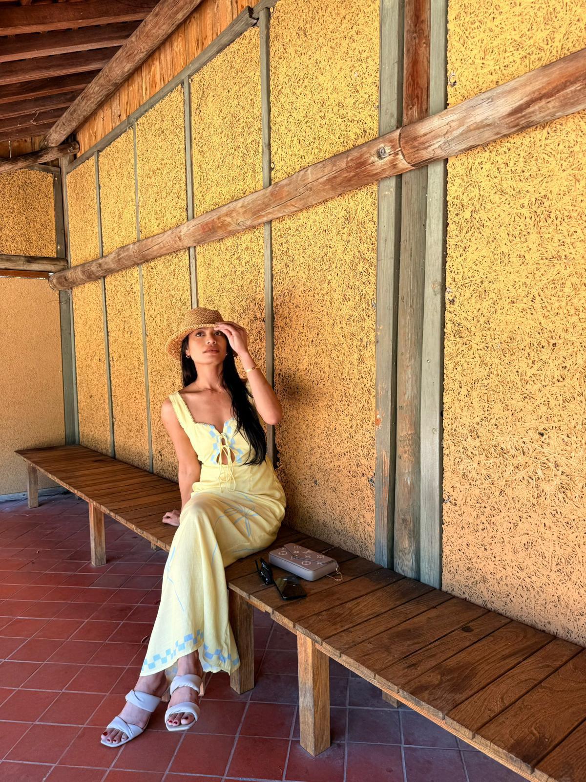 A breezy, lemon- yellow maxi dress